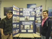 VUHS Sophomores Trevor Patterson and Megan Stearns stand by their exhibit board for Vermont History Day, based on theme of Debate & Diplomacy in History and addressing the issue of Lincoln's Dilemma: The Future of The Union. 